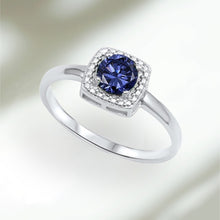 Load image into Gallery viewer, Simulated Tanzanite Halo &amp; CZ .925 Sterling Silver Ring